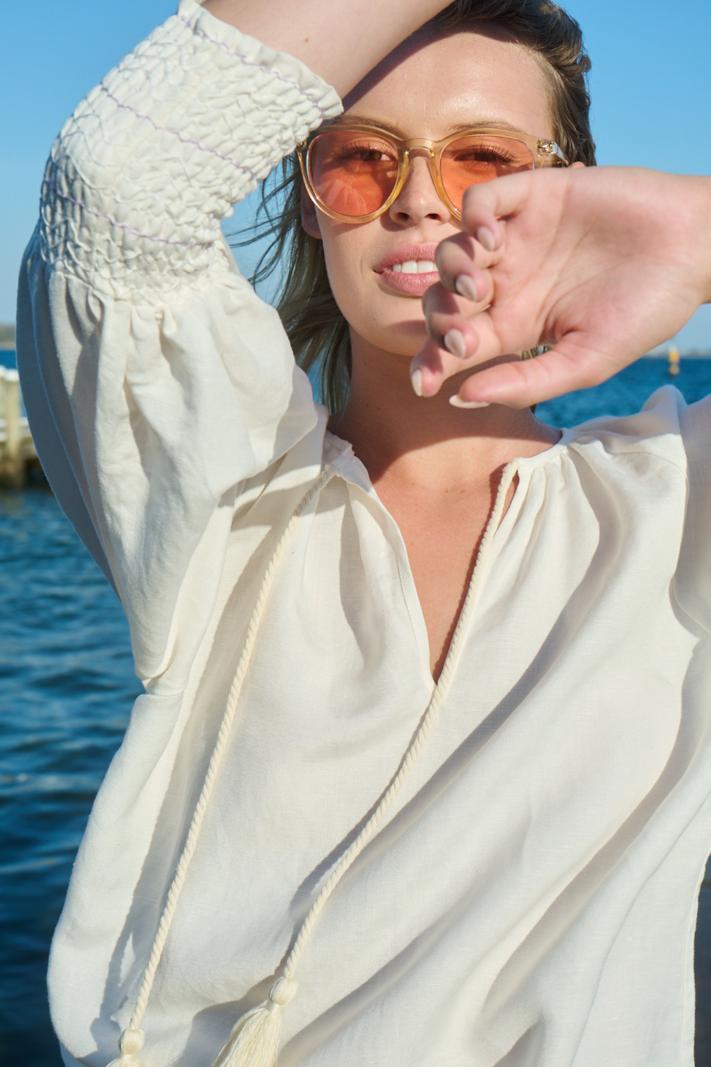 model wearing white linen blouse top relaxed