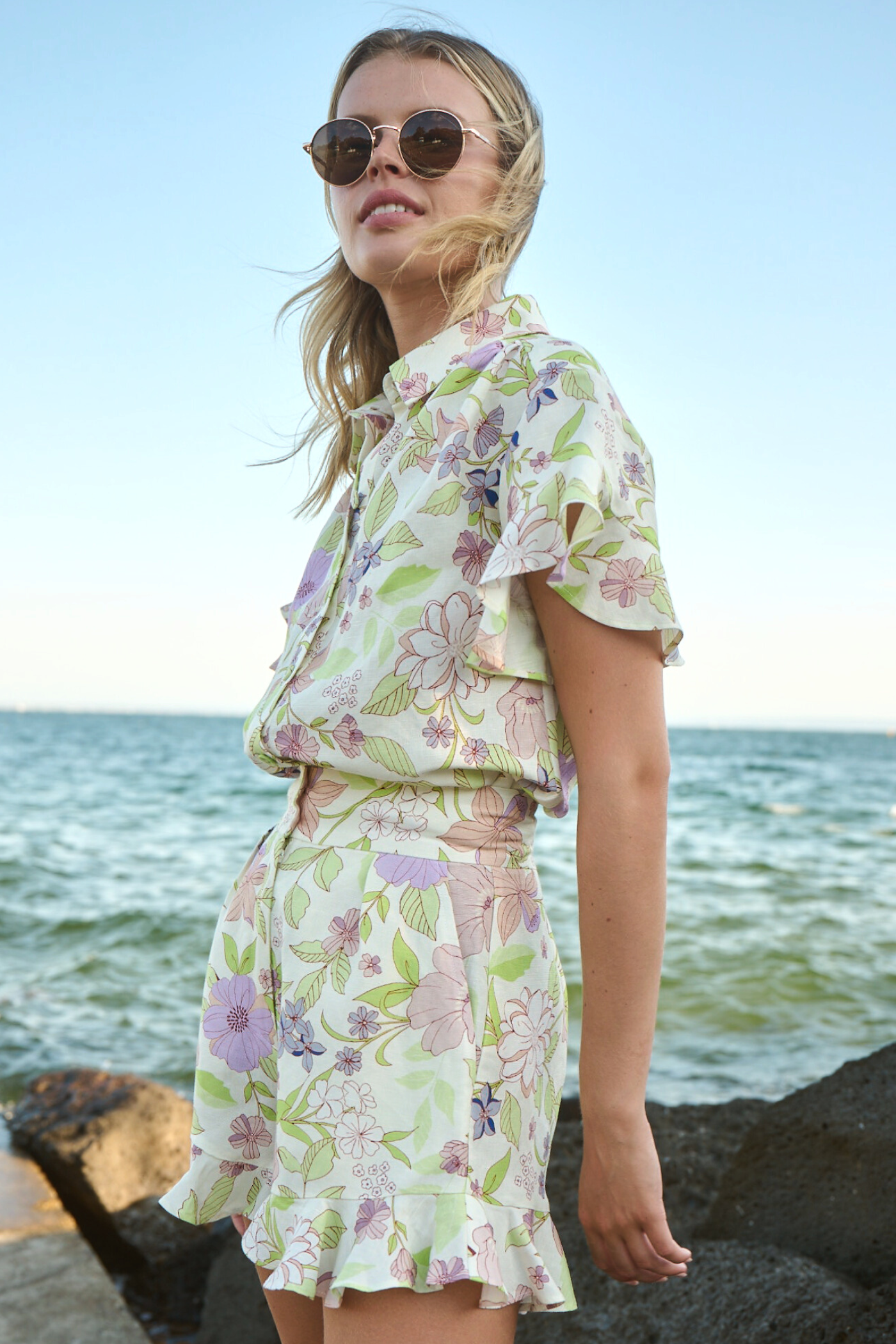 floral patterned short and top set on model