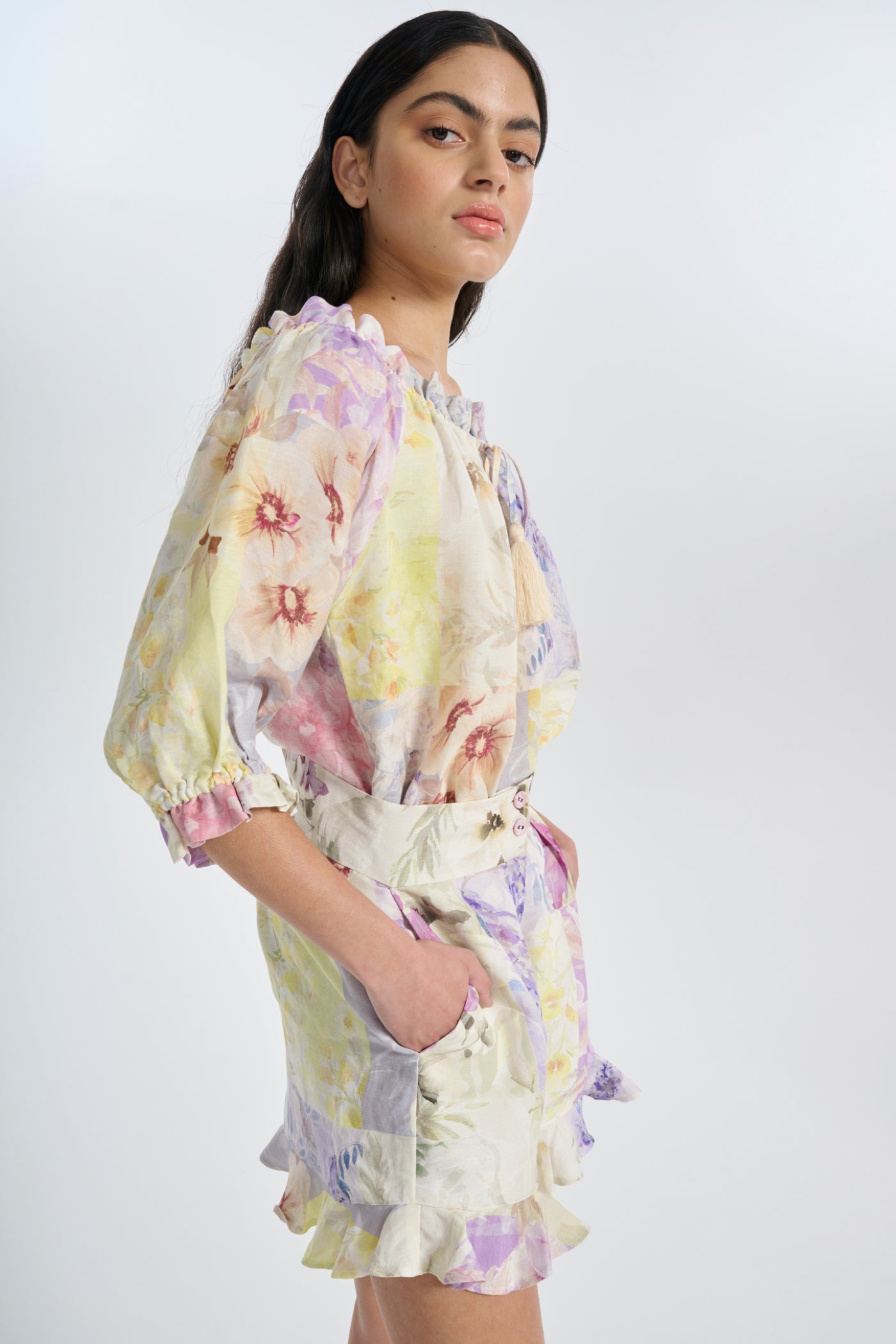 girl wearing matching co ord printed linen