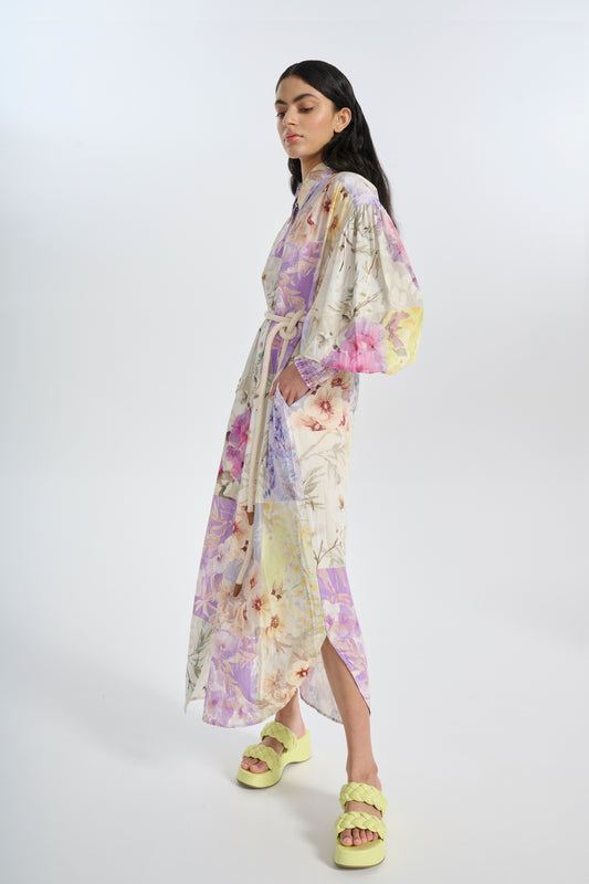 woman wearing printed silk shirt dress