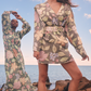 models posing at the beach in green floral dresses